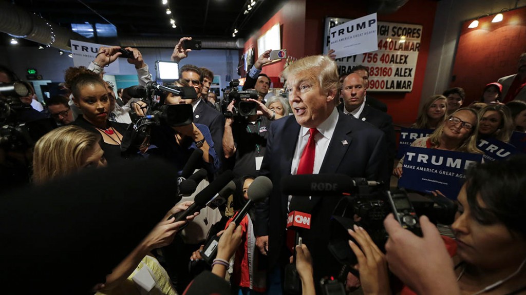 Republican presidential candidate Donald Trump answers questions from reporters at the National Federation of Republican Assemblies on Saturday, Aug. 29, 2015, in Nashville, Tenn. (AP Photo/Mark Humphrey)