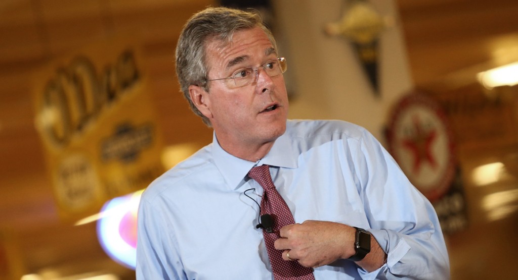 ANKENY, IA - AUGUST 13: Republican presidential candidate Jeb Bush speaks at Dennis Albaugh's Classic Car Barn during the Polk County GOP Annual Summer Sizzle event August 13, 2015 in Ankeny, Iowa. Bush is scheduled to attend the Iowa State Fair tomorrow. (Photo by Win McNamee/Getty Images)