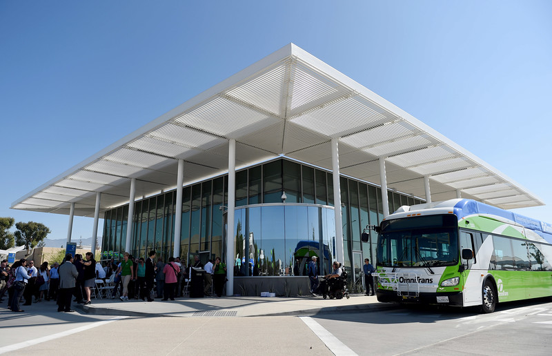 "Local officials and members of the community attend the completion ceremony for the new San Bernardino Transit Center in San Bernardino, Ca., August 25, 2015. The new transportation hub will open officially on September 8, with ten local bus routes, two freeway express Omnitrans bus routes, sbX green line, Victor Valley Transit Authority, and Mountain Transit. The site is next to a Metrolink San Bernardino line extension to be finish some time in 2017. (Photo by John Valenzuela/The Sun)"