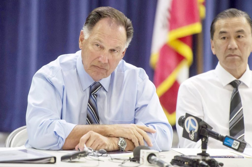 Orange County District Attorney Tony Rackauckas participates in a media roundtable to discuss the Informant Policies & Practices Evaluation Committee (IPPEC) report released today in regards to the OCDA. ///ADDITIONAL INFO: snitchreport.0105 - 1/4/16 - PHOTO BY JOSHUA SUDOCK, STAFF PHOTOGRAPHER - The Orange County District Attorney's office hosts a media roundtable to discuss the Informant Policies & Practices Evaluation Committee (IPPEC) report released today in regards to the OCDA. A committee of legal experts hand-picked by Orange County District Attorney Tony Rackauckas on Monday issued a report declaring his office a “rudderless ship” and calling for a deeper investigation into the use of jailhouse informants. The five-member panel called for the Orange County Grand Jury, the state Attorney General or the U.S. Department of Justice to investigate allegations that prosecutors and police misused a covert network of jailhouse informants and withheld evidence from defense attorneys. The state already is conducting an investigation. While Rackauckas admits that there were problems with management which lead to questions regarding the ethics/legality of using jailhouse informants without disclosing their findings to defense attorneys, he maintains that the office did nothing wrong and that any contrary belief is a byproduct of poor reporting by members of the press. Picture made at The Orange County District Attorney's Office law library in Santa Ana, California on Monday, January 4, 2015.